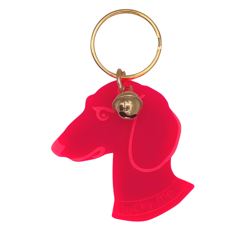 Schlüsselanhänger Dackel Kopf mit Glocke in neon pink transparent 